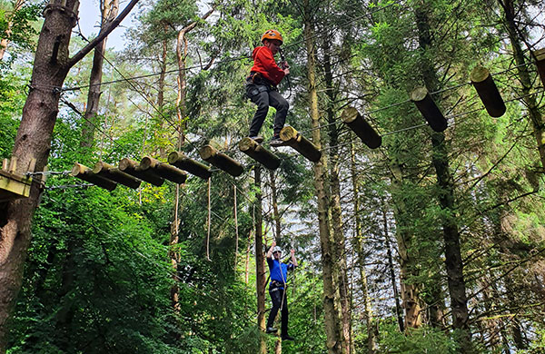 People on tree top course